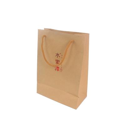 China Recycled Materials Wholesale Custom Logo Size Brown Kraft Paper Gift Paper Bag With Ribbon Handle For Tea Packaging for sale