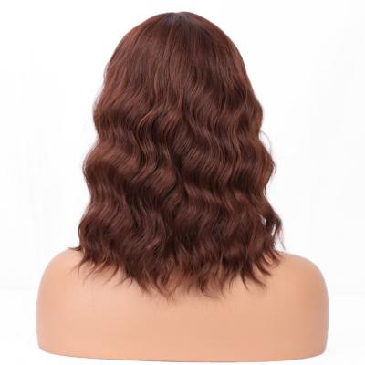 China Good Quality Short Bob Water Wave Synthetic Wavy Wigs Short Bob Gold Wig With Orderly Bangs Heat Resistant Wholesale Price for sale