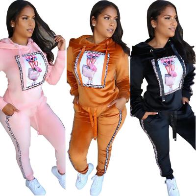 China Anti-Static Women S Stylish Pants And Top Cartoon Two Piece Set With Hood JA120 for sale