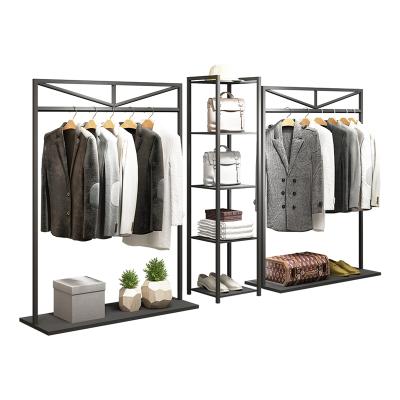 China Gold Metal Stainless Steel Man Store Retail Clothing Racks Indoor Clothing Display Shelves Shelves Rack For Showrooms Stores for sale