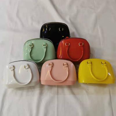 China 2021 high quality mini pvc girl bag jelly bag small bags new shell purse messenger children child coin purse female candy color for sale