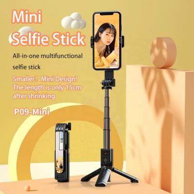 China 2021NEW Portable Lightweight Mini Fold Selfie Stick With Detachable Tripod Stand HD Rearview Mirror Wireless Remote Control for sale