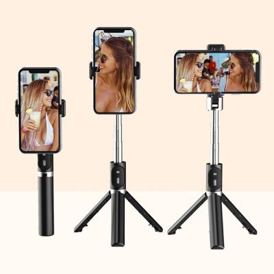 China Folding 360 Degree Rotation Mini Extendable 3 in 1 Aluminum Selfie Stick Tripod with Wireless Outdoor and Tripod Mount for sale