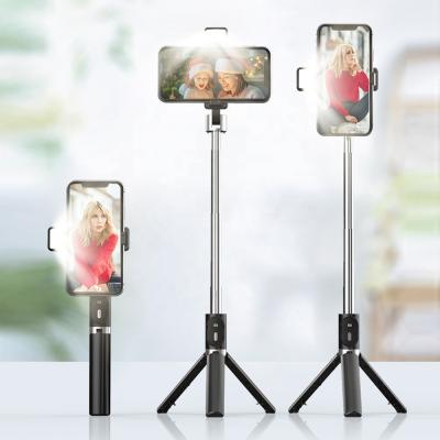 China Fold Selfie Stick With Mini Smart 360 Rotation Wireless Tripod New Fill Light Control Flexible Mobile Phone Selfie Stick for sale