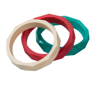 China Eco-Friendly Stylish Jewelry For Moms White Red Green Teething Silicone Bracelet for sale