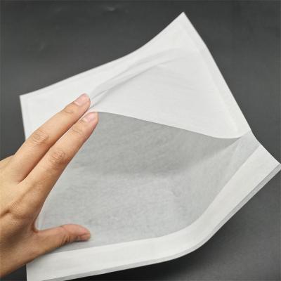 China Recycled Materials Wholesale Embossed Mini Semi Disposable Self Seal Transparent Biodegradable Envelope Glassine Wax Paper Bag for sale