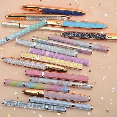 China Rose Gold Lash Glue Pen Waterproof Slim Liquid Eyeliner Adhesive Pencil for Makeup for sale