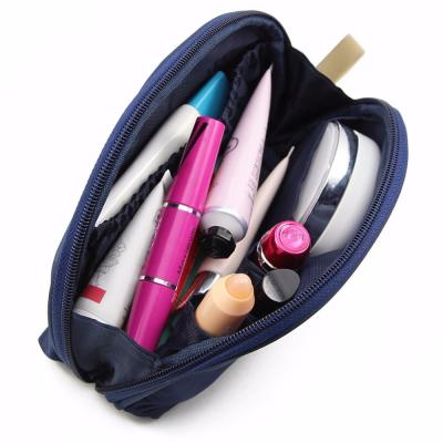 China Lady Mini Portable Waterproof Nylon Organizer Case Travel Cosmetic Bag for sale