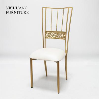 China Modern Wholesale Elegant Stacking Hotel Gold Party Events Wedding Metal Chair for sale