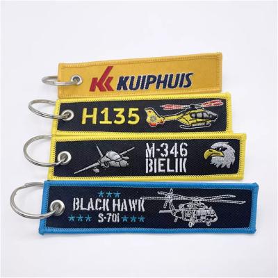 China China factory wholesale price letter logo textile key chain travel suitcase custom intricate graphic custom pendant woven label Key Chai for sale