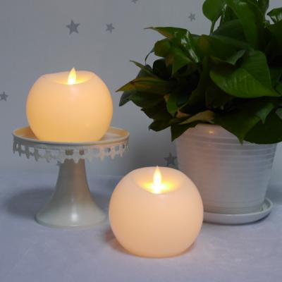 China Remote Control LED Dancing Wick Ball Shaped Candles For Christmas Decoration for sale