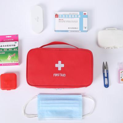 China Water Resistant Portable Red Emergency Personnel Storage Contract First Aid Bag Survival Kit Medicine Bag for sale