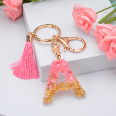 China New 26 Letter Environmental Friendly Tassel Rose Key Chain Rings Initial Alphabet Gold Keyring Acrylic Resin Keychains for sale