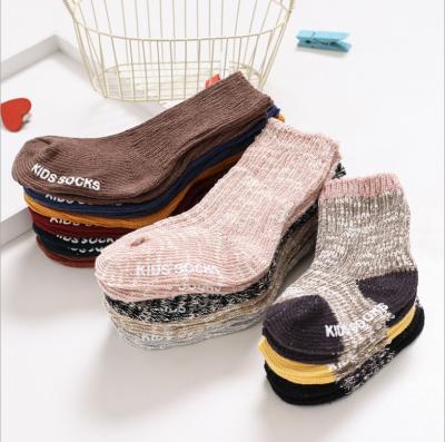 China Newest QUICK DRY wicking yarn children's fall winter non-slip floor thicken baby children's loose slouch socks for sale