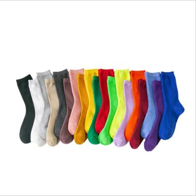 China Newest original design QUICK DRY fluorescent color letter Harajuku tube jars basketball sports socks for sale