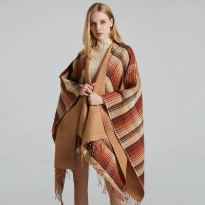 China Scottish classic color plaid cape imitation cashmere tassel thickened spring 2023 classic Scottish color plaid cape imitation cashmere tassel shawl thickened hot US street style european pashmina for sale