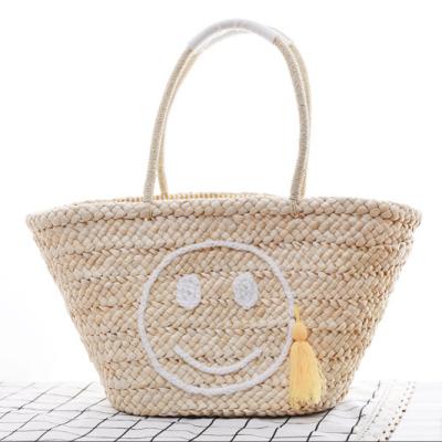 China Chinese Supplier TOGGLE BAG Women's Fashion Smile Tassel Beach Handwoven Bag for sale