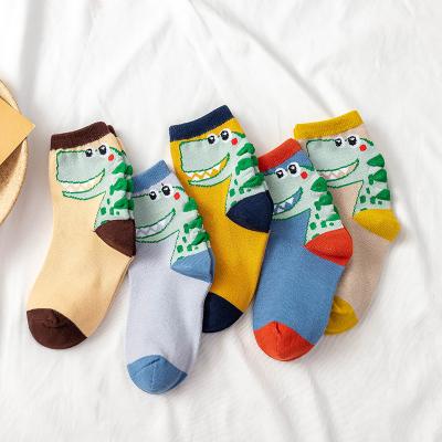 China New QUICK DRY cotton socks boys and girls cute dinosaur tube little bumps 1-12 years old baby socks for sale