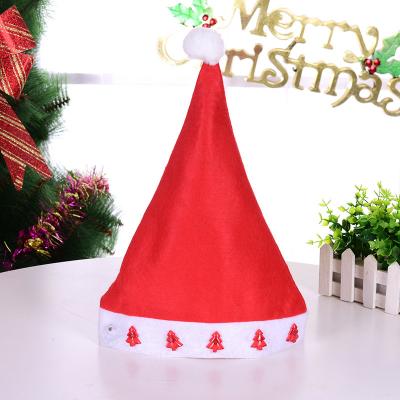 China Eco-Friendly Light Up Christmas Hats Manufacturers Wholesale Red Christmas Hats With Felt Printed Led Lights Nonwoven Adult Children Hats for sale