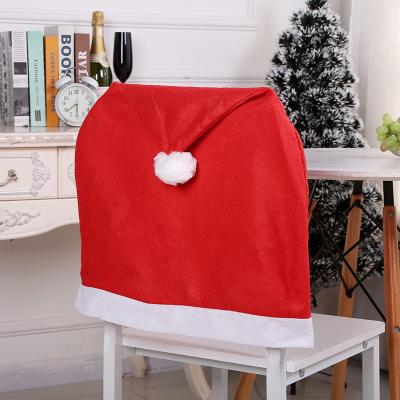 China Eco-friendly Christmas Chair Covers Christmas Crafts Santa Hat Tiktok Hot Selling Nonwoven Decorative Wholesale Christmas Hats Chair Covers for sale