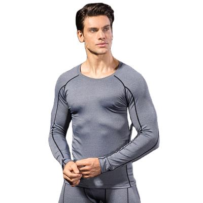 China Cheap Breathable Gym Yoga Wear Tracksuit For Men Running Tight Fitness Leggings Wholesale Custom for sale