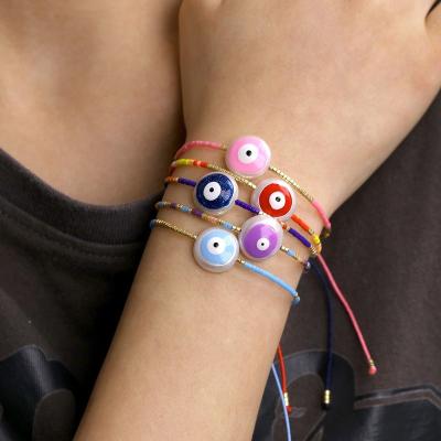 China New Trendy Fashion Grass Seed Beads Enamel Turkish Eye Adjustable Bracelet For Teen Girl for sale