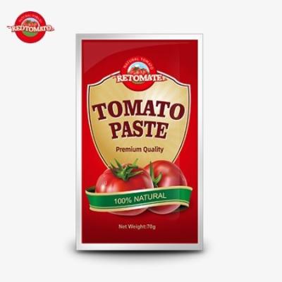 China Saquetes planos de 70 g de pasta de tomate a preço de fábrica com níveis de pureza que variam de 30% a 100% à venda