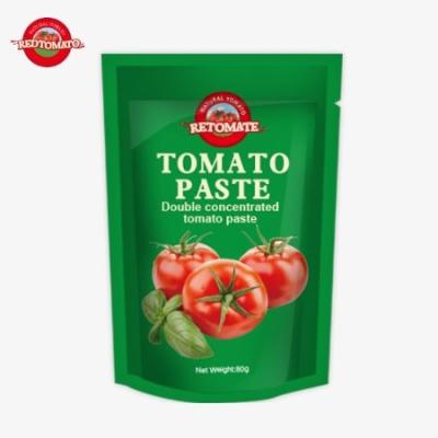 China 80g Stand-Up Pouch Of Double-Concentrated Tomato Paste Available With Purity Levels Ranging From 30% To 100% for sale