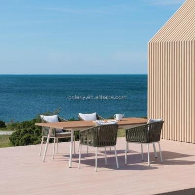 China Contemporary All Weather Luxury Outdoor Rope Woven Dining Table and Chairs Modern Design Furniture Garden Dining Set for sale