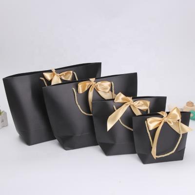 China Small white rose cardbosrd christmas bags recyclable for gift for sale