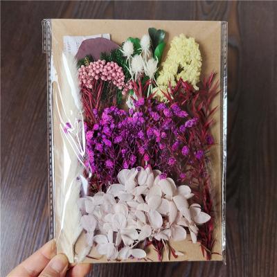 China DIY decoration for nail art candles and greeting cards flower material package candle plant immortal diy scented paint dry flower floating bottle for sale