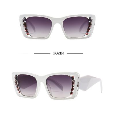 China Fashion sunglasses 2022 hot sale original unisex cat eye sunglasses brand triangle metal logo label OEM irregular luxury double color for sale