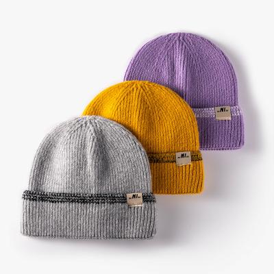 China COMMON Wholesale Thickened Outdoor Thermal Woolen Hats Of Autumn And Winter Curling Letters for sale