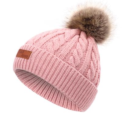 China COMMON Autumn And Winter New Wool ball knitted hat personality children's wool hat letter labeling hat for sale