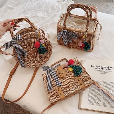 China Other Top Handle Female Shoulder Cross - Body Bow Round Bali Straw Rattan Bag Women Casual Handmade Woven Bag for sale