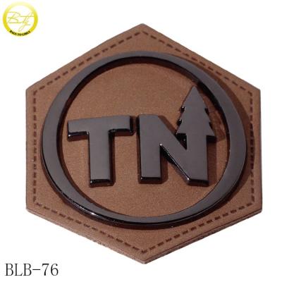 China Sustainable Custom Embossed PU Brown Leather Apparel Label With Logo Faux Leather Jeans Patch Netting for sale