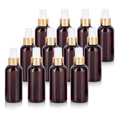 China Beverage 12 Pack 4 Ounce Boston Amber Glass Bottles With Gold Fine Mist Sprayer Spray for sale