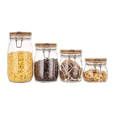 China Non Spill 4 Pack 500ml Airtight Food Storage Glass Jar With Bamboo Lids for sale