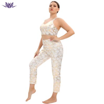 China Custom Fitness Breathable Anti-UV Eation New Designs Plus Size Snake Embossed Printing Yoga Sets For Woman for sale