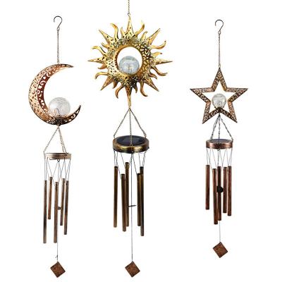 China Drainage Moon Star Sun Solar Powered Fairy Wind Chime Led Wind Chime Solar Light Garden Decoration Cardinal Chime for sale