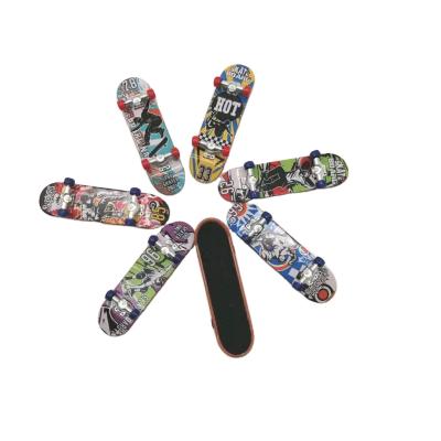 China Classic Decompression Toys Skateboard Finger Sports Scooter Desktop Skateboard Toys For Children for sale