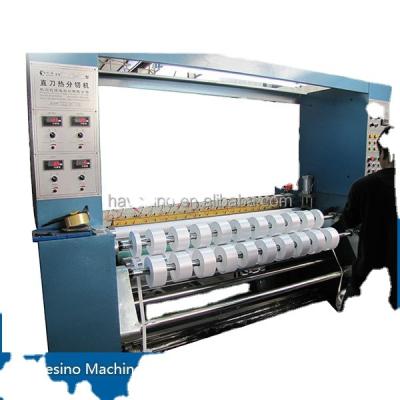 China Heating blade polyester fabric and textile heat cut machine for satin non-woven Fabric Roll Slitting Machine Slitting Machine for sale