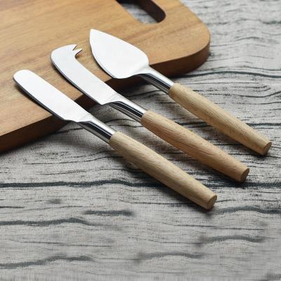 China Sustainable Hot Selling Kitchen Tools 3 Pieces Cheese Knife Stainless Steel With Wooden Handle for sale