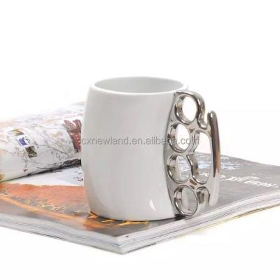 China Ceramic Shape Viable Handle Fist Coffee Promotion Empty Black White Mug for sale