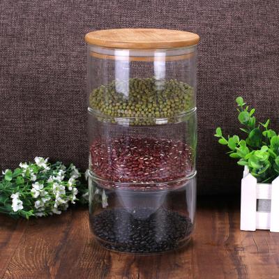 China Viable Mini Airtight Cylinder Food Candy Container Cheap Price Small Glass Jar Storage Jar With Wooden Top Lid for sale