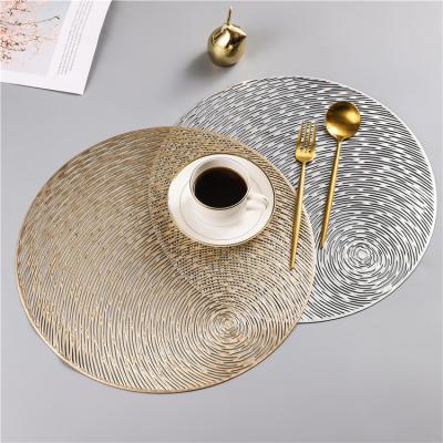 China Viable Gold Style Table Mats 38cm PVC Table Place Mat Modern Round Table Mats Heat Insulated Pads for sale