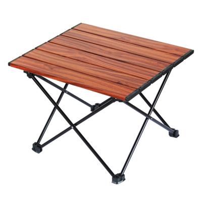 China New Design Comfortable Foldable Ultralight Wood Grain Aluminum Camping Table for sale