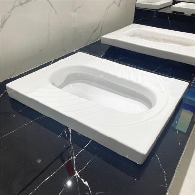 China Modern High Quality Sanitary Ware Ceramic Bathroom Ware Hotel Public Toilet WC Squatting Pan Toilets for sale