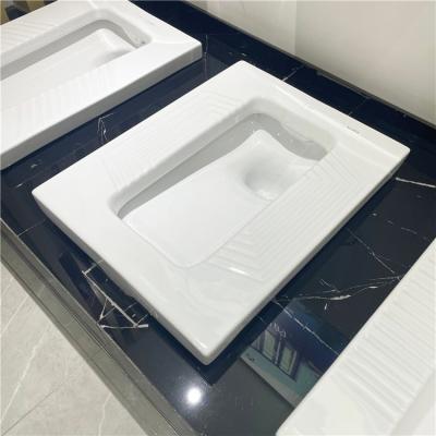 China Gloaay Modern Cheap High Temperature White Porcelain Squat Pan Ceramic Firing Price Bathroom WC Squat Toilet for sale