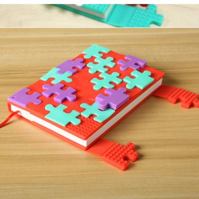 China Hardcover Puzzle Rainbow Color Cover Notebook Rubber Notebook for sale